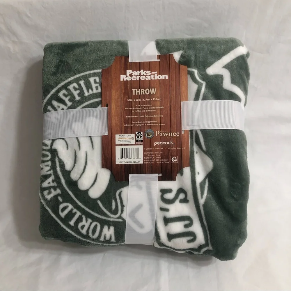 Throw plush soft cozy Park and Recreation Pawnee graphic green. 50in x 60 in